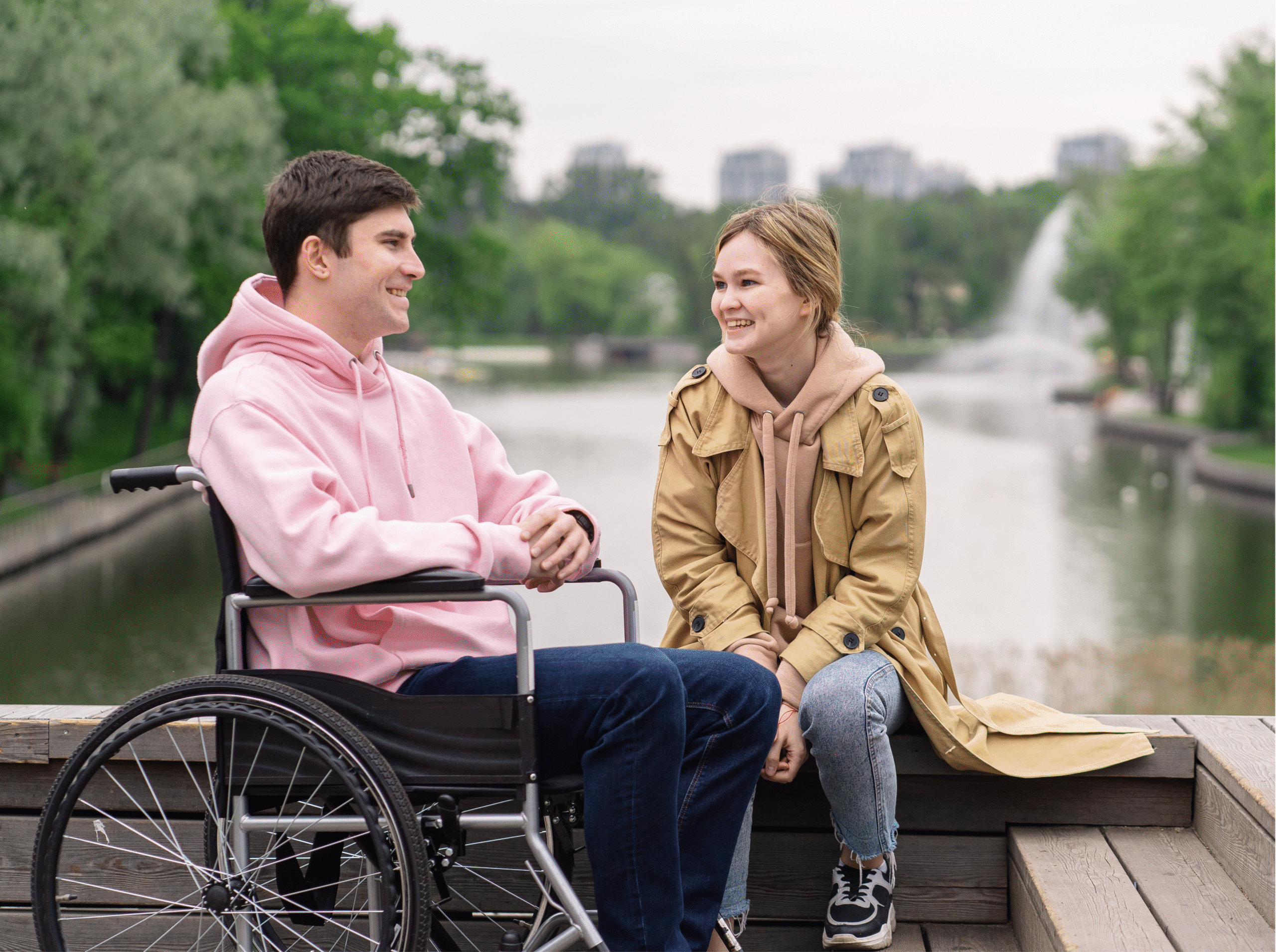 Canva male in wheelchair with female companion scaled